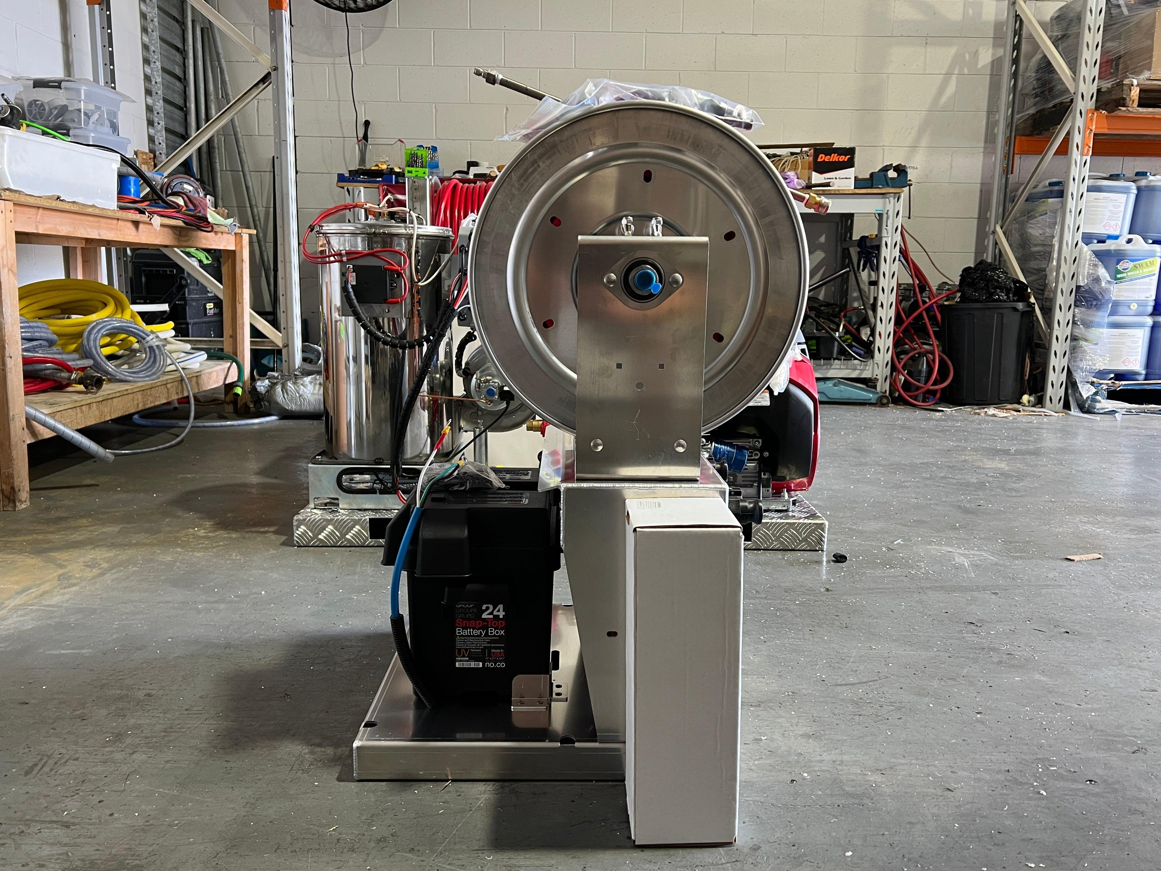 Complete system offering Sturdy base and hose reel in a handy elevated position. 2 x 12V Versajet Pumps, Ample hose and quality fittings and fixtures.